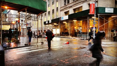 People walking on city street