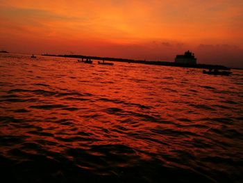 Scenic view of sea at sunset