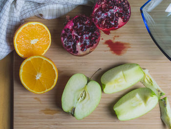 High angle view of fruits on cutting board