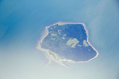 Aerial view of snow covered land