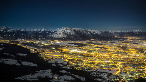 Aerial view of snowcapped mountain at night