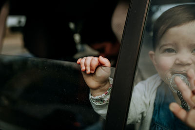 Portrait of cute boy holding glass