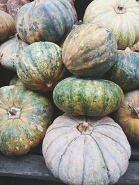 High angle view of pumpkins for sale at market stall