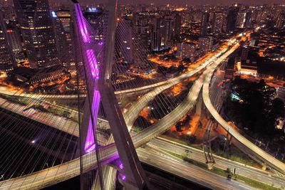 High angle view of light trails on elevated road at night