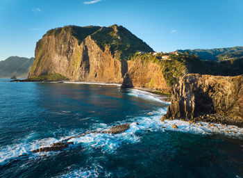 Scenic view of sea against clear sky