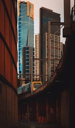 Low angle view of modern buildings against sky in city