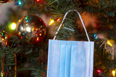 Close-up of christmas decoration hanging on tree