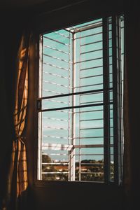 Blue sky seen through window at home