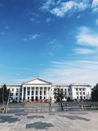 Facade of historic building against blue sky