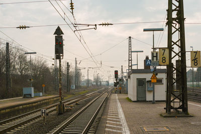 Train on railway tracks against sky