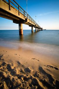 View of bridge over sea against sky