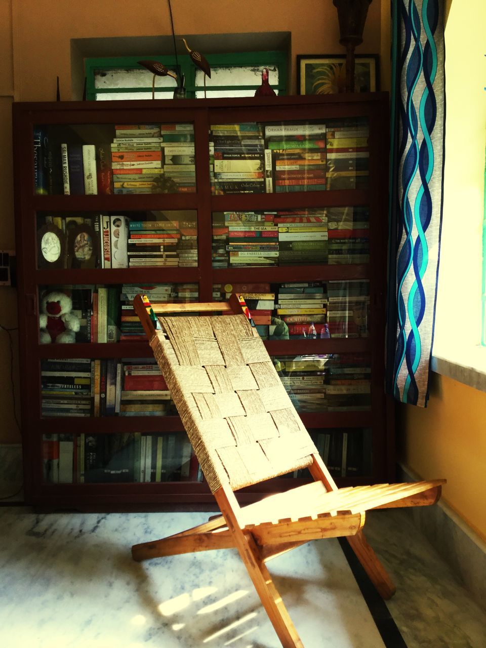 indoors, wood - material, table, home interior, still life, no people, old, absence, wooden, chair, old-fashioned, education, stack, wood, furniture, equipment, book, shelf, close-up, retro styled