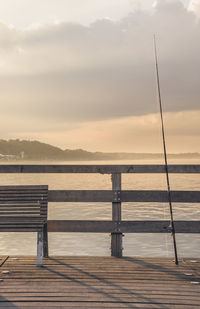 Pier on sea against sky