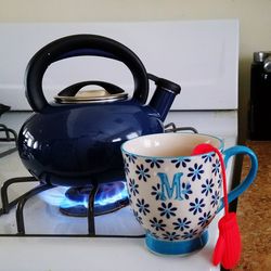 Close-up of coffee cup at home