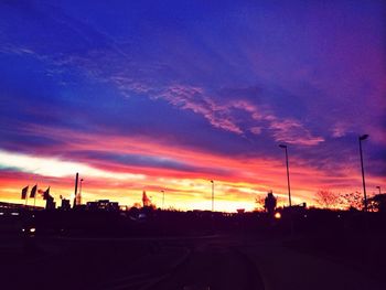 Scenic view of dramatic sky at sunset