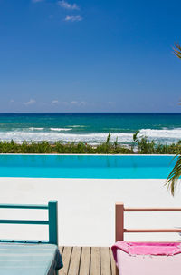 Scenic view of sea against sky seen from beach hut