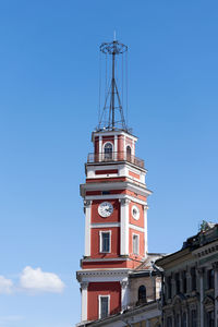 Low angle view of clock tower against sky