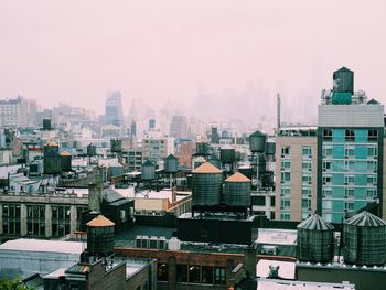 High angle view of water storage tanks on buildings