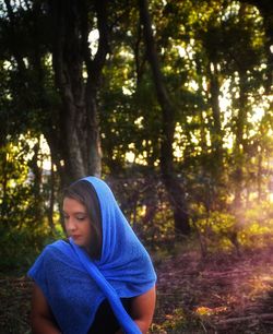 Portrait of woman in forest
