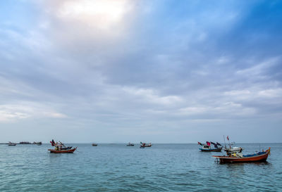 Small fishing boats coastal drift after returning from fishing