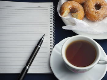 Close-up of coffee served on table