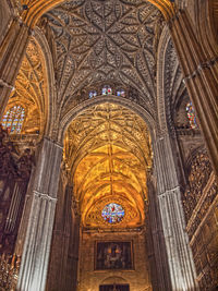 Low angle view of ornate ceiling of building