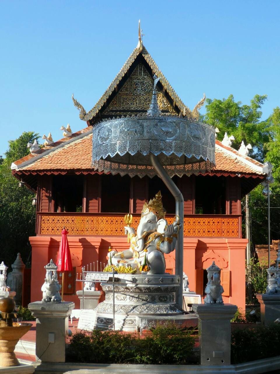 building exterior, architecture, built structure, religion, place of worship, spirituality, temple - building, statue, clear sky, sculpture, art and craft, art, human representation, low angle view, temple, creativity, church