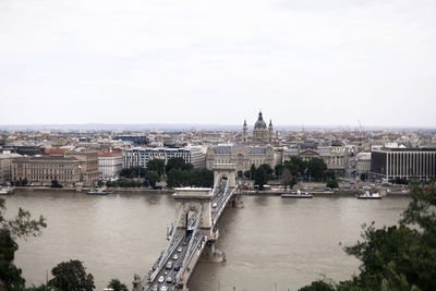 View of cityscape against river