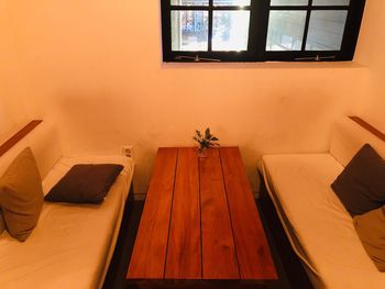 High angle view of chairs on table at home