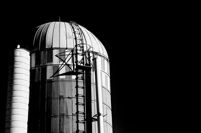 Low angle view of silo against clear sky