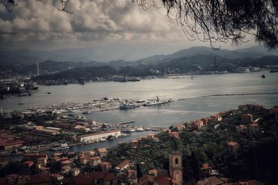 High angle view of city by lake
