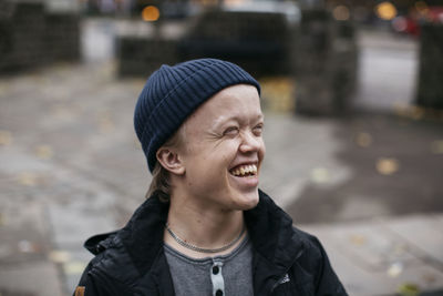 Portrait of teenage boy laughing