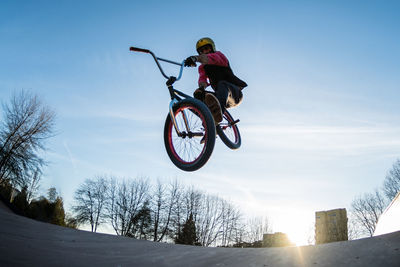 Low angle view of bicycle against sky