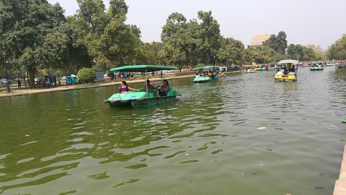 People on boat in river