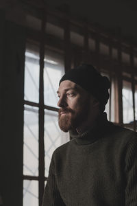 Portrait of young man looking away