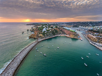 High angle view of sea against sky during sunset