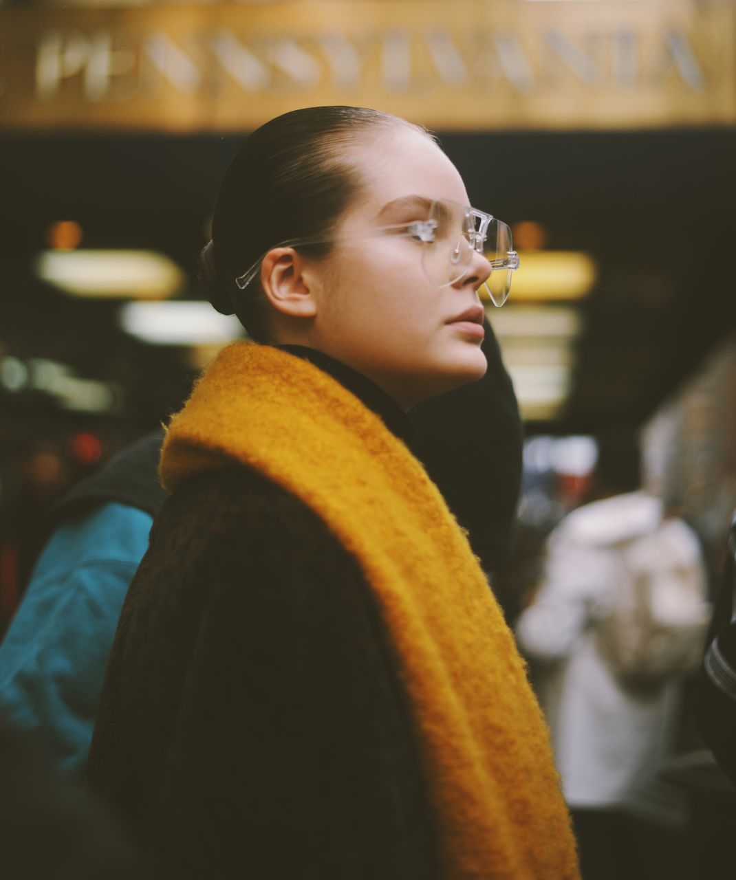 one person, real people, looking, lifestyles, looking away, focus on foreground, side view, leisure activity, portrait, young adult, clothing, indoors, casual clothing, headshot, warm clothing, waist up, contemplation, transportation, scarf, beautiful woman