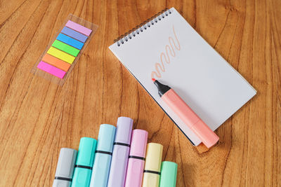 High angle view of colored pencils on table