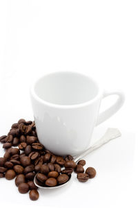 Close-up of coffee cup against white background