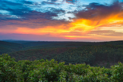 Scenic view of dramatic sky during sunset