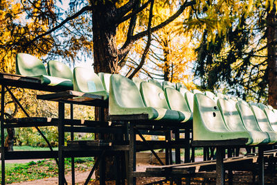 Empty chairs in park