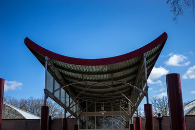 Low angle view of building against blue sky