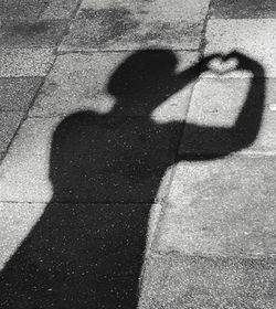 Shadow of man standing on floor