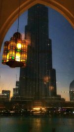 Illuminated buildings in city at night