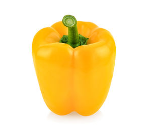 Close-up of yellow bell pepper against white background