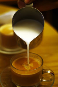 Close-up of coffee cup on table