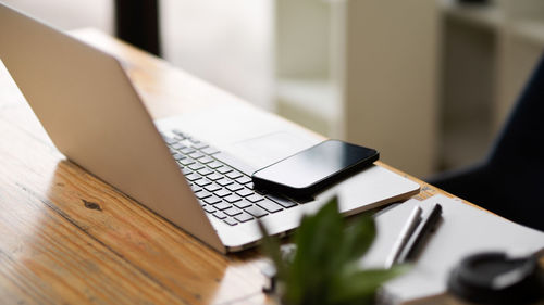 Close-up of laptop on table