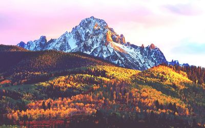 Scenic view of mountains against sky during sunset