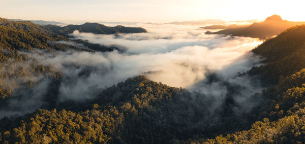 Scenic view of mountains against sky during sunset