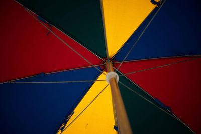 Low angle view of multi colored umbrella